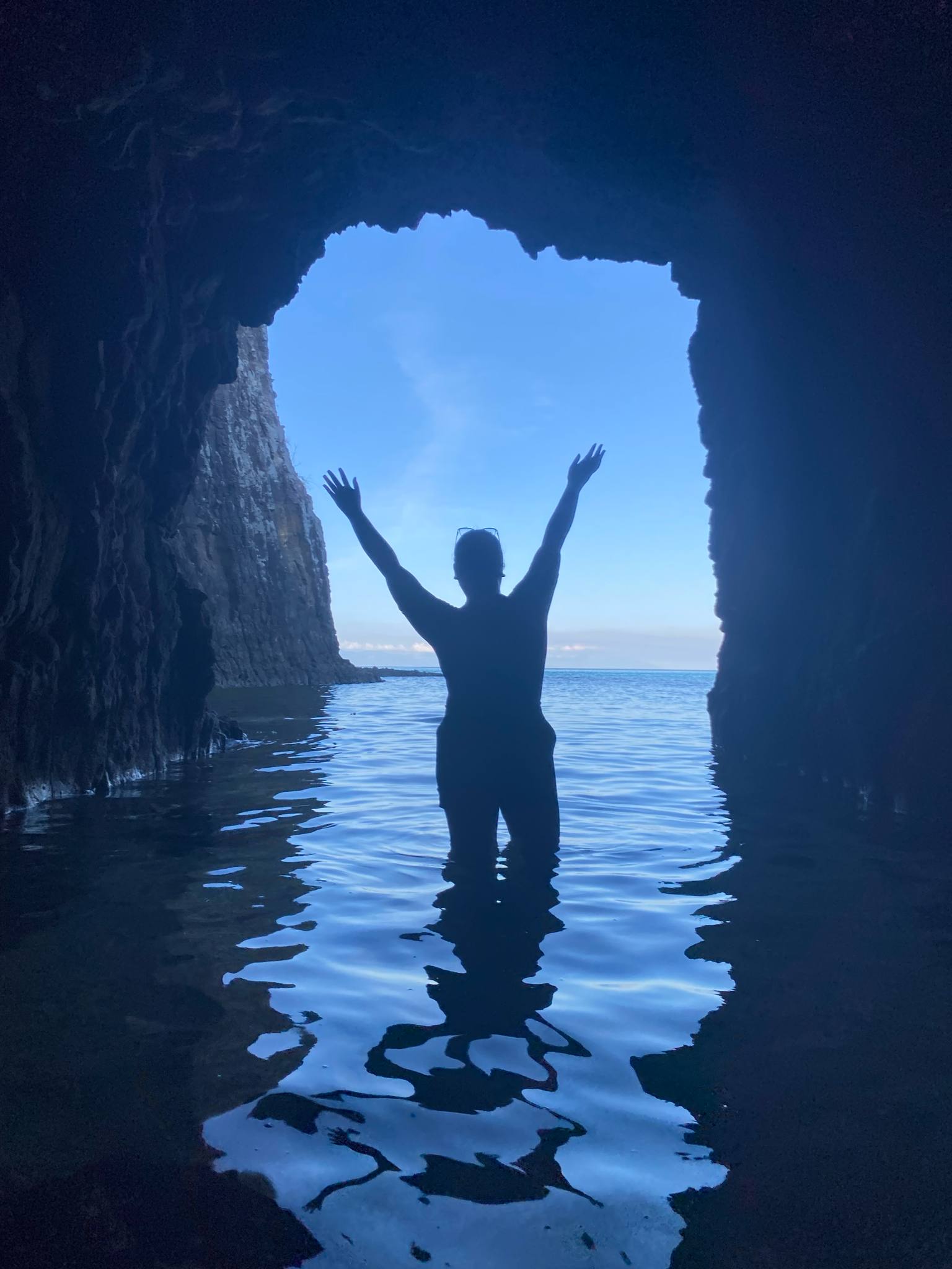 A woman traveler inside Marina Cave in Tingloy, Batangas,